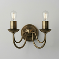 Double Arm Brass Wall Sconce with Exposed Bulbs