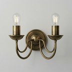 Double Arm Brass Wall Sconce with Exposed Bulbs