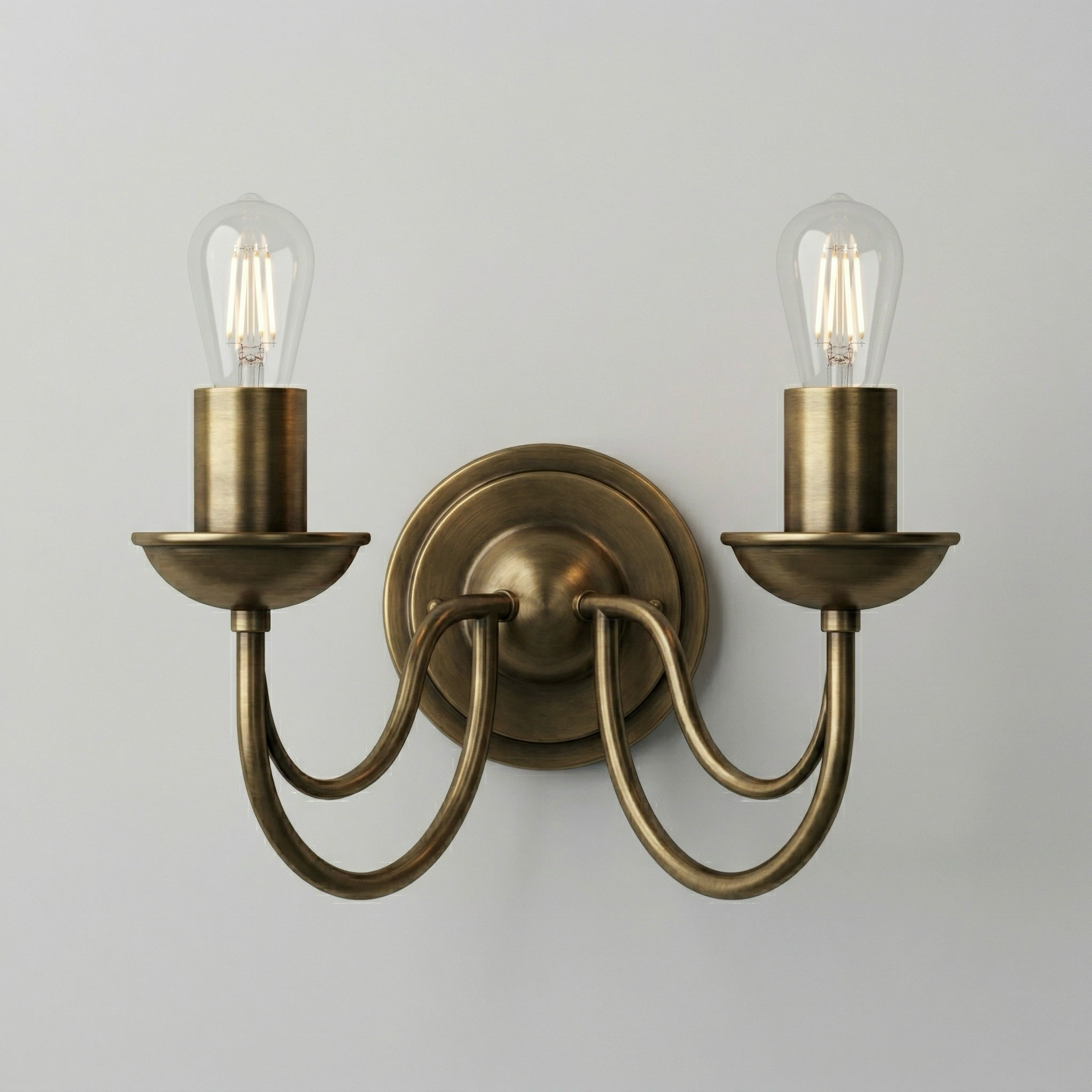 Double Arm Brass Wall Sconce with Exposed Bulbs